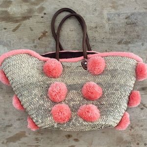 Marrakech Peach Pom Pom Straw Beach Basket from Anthropologie